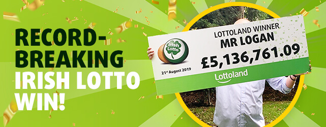 Mr Logan holds cheque showing his £5 million win from betting on Irish Lotto with Lottoland
