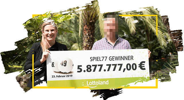 Ganhador anônimo na Loteria Alemã segura cheque com prêmio