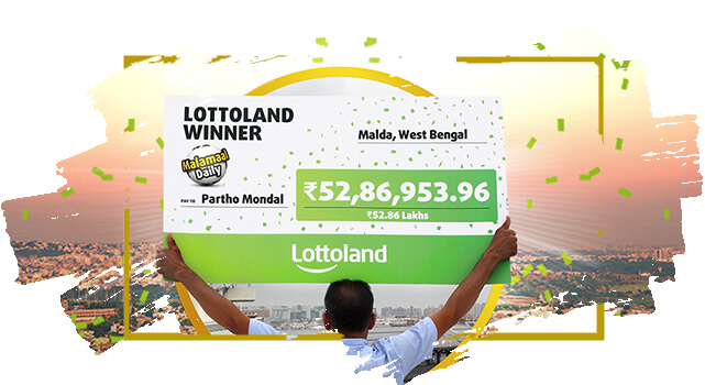 First big winner from India holding his cheque for 52.8 Lakhs